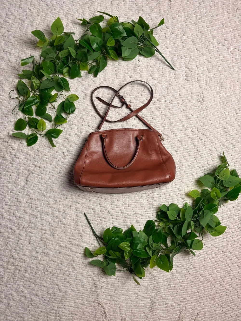 Brown Coach leather and gold-tone hardware RETAIL PRICE IS $395